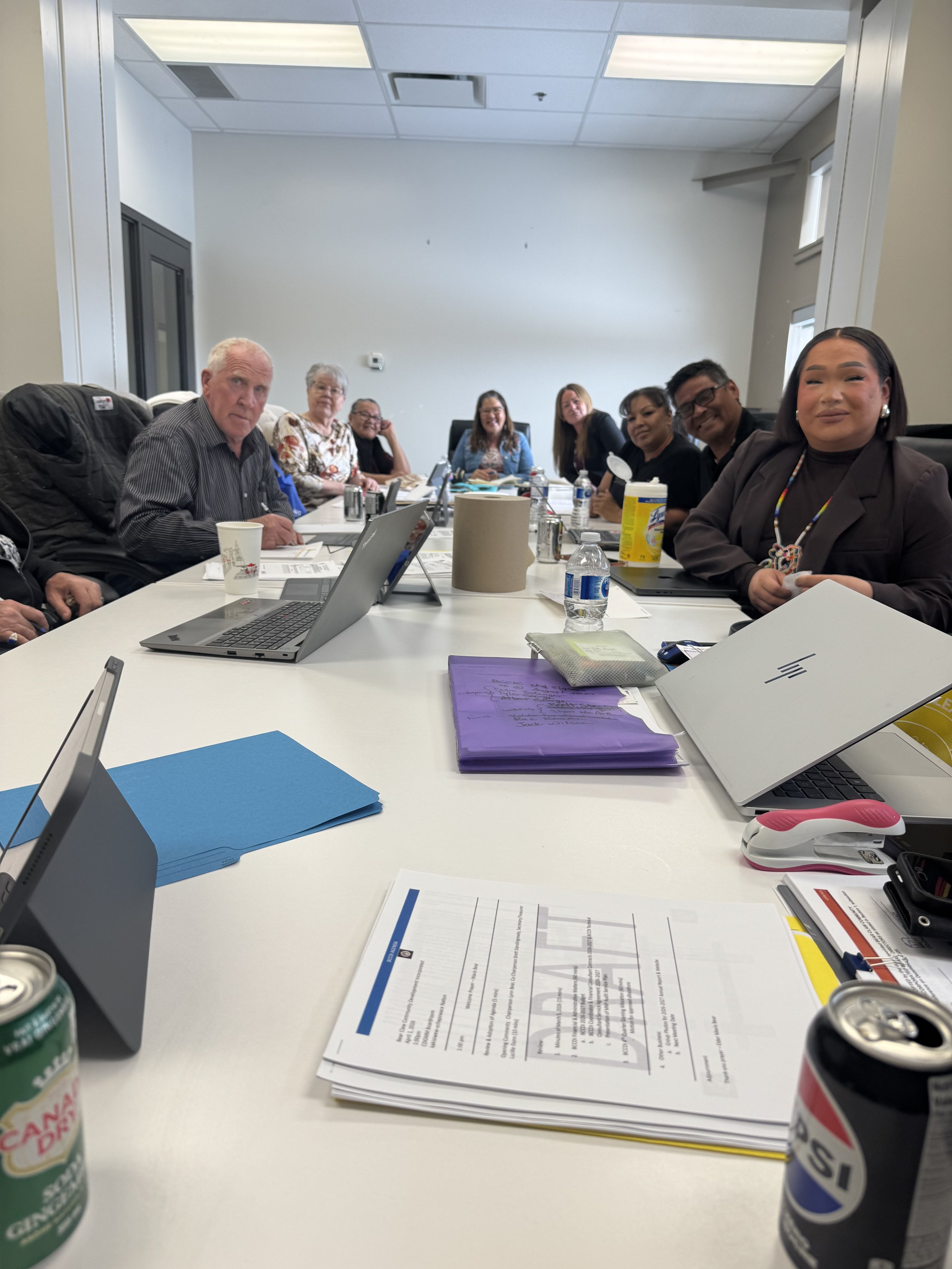 Bear Claw CDC board members gathered around a working table
